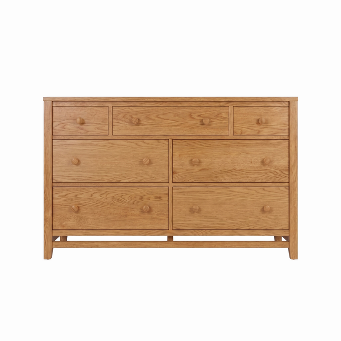 Stratton Seven Drawer Dresser — Oak wood reference; selected finish may differ
