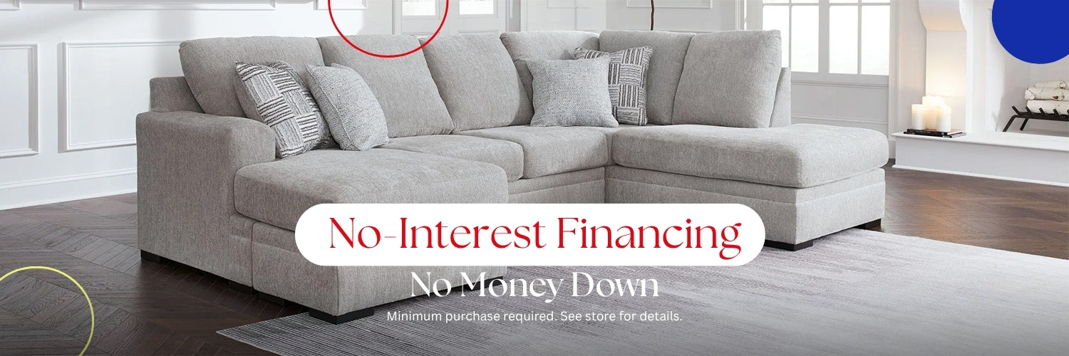 Couch in living room area with the message no Interest Financing =.